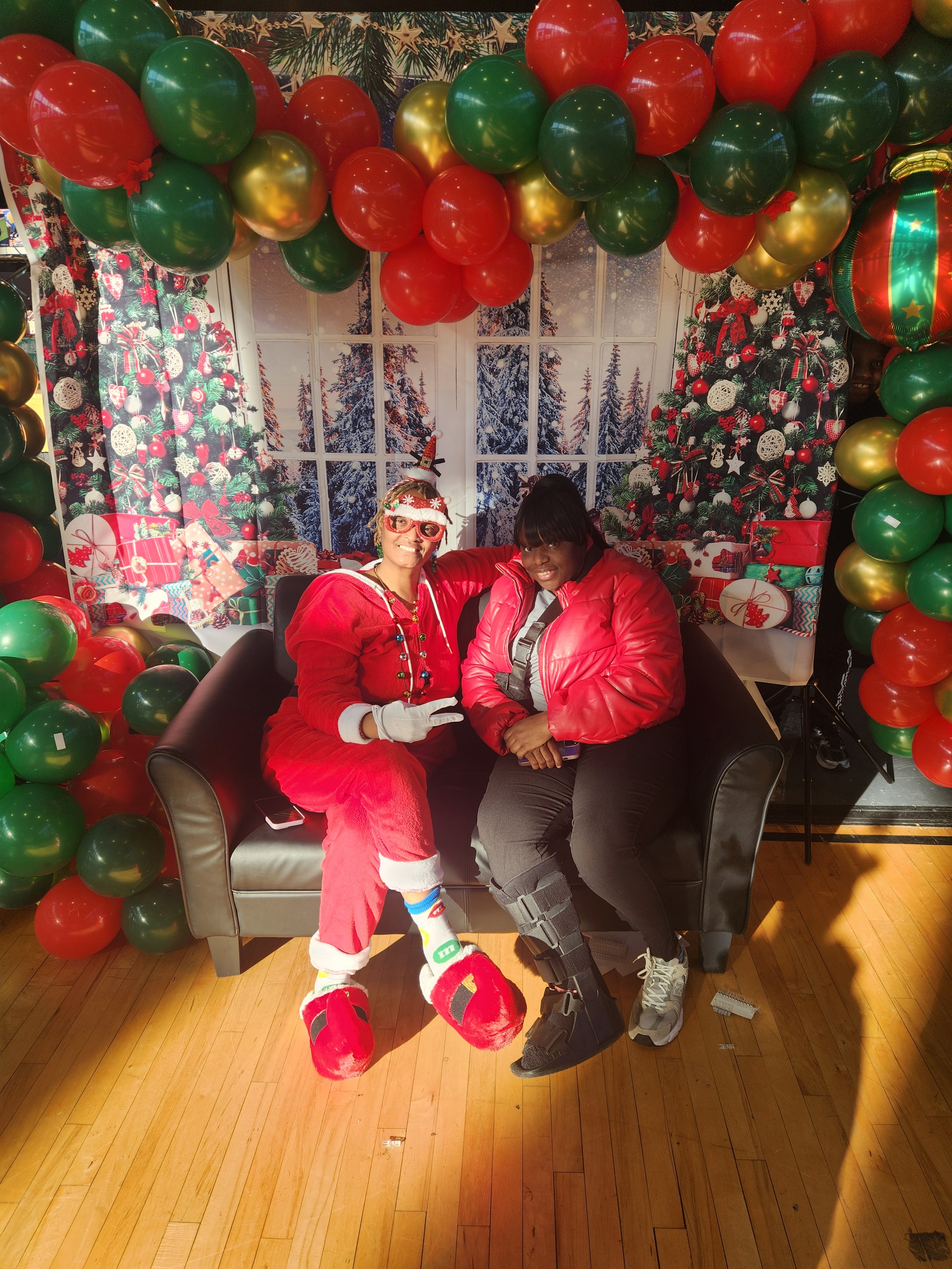 MDLAYAFS Inc. — community members at holiday photo booth
